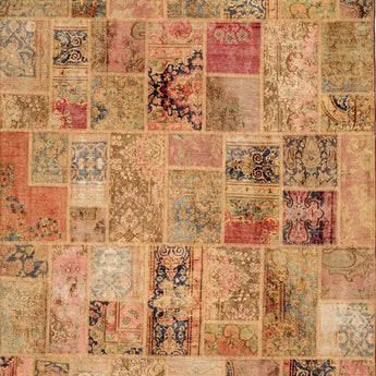 A beige patchwork carpet with orange/pink details